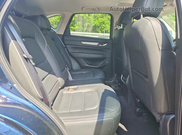 JM3KFBEM5S0602563 2025 MAZDA CX-5 Blue Widok wnętrza z tyłu