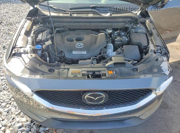 JM3KFBEY9M0354596 2021 MAZDA CX-5 Charcoal Vista interior trasera