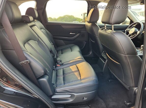 JM3KKAHD2S1192252 2025 MAZDA CX-90 Black Widok wnętrza z tyłu