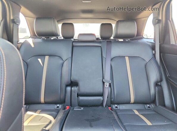 JM3KKDHC2S1243905 2025 MAZDA CX-90 Burgundy Rear seats view