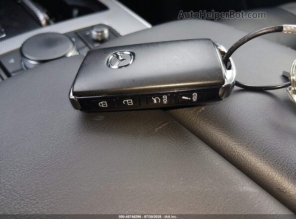 JM3KKEHD4S1230684 2025 MAZDA CX-90 Gold Vista del salpicadero