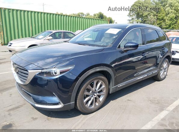 JM3TCADY2M0512592 2021 MAZDA CX-9 Dark Blue Vista tres cuartos delantera izquierda