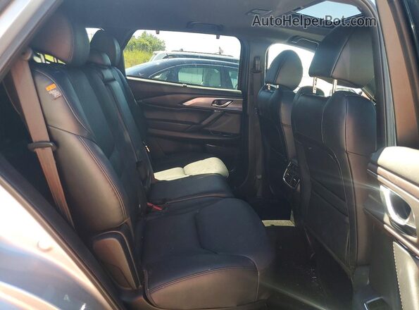 JM3TCBDY9J0216518 2018 MAZDA CX-9 Silver Rear interior view