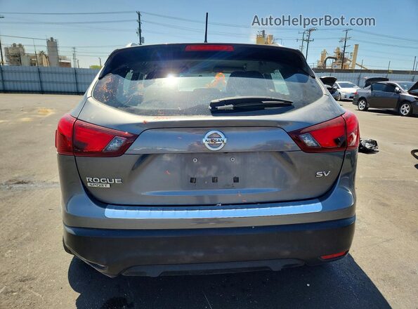 JN1BJ1CP5HW033575 2017 NISSAN ROGUE Gray Rear view