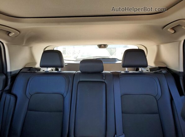 JN1DF0BB7RM735985 2024 NISSAN ARIYA White Vista de los asientos traseros