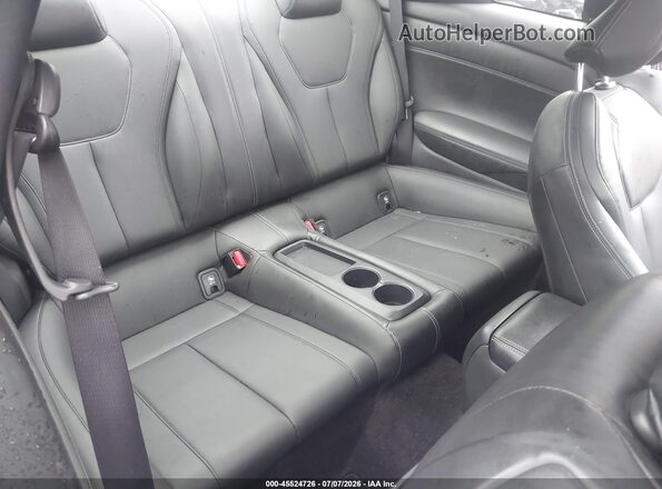 JN1EV7EL1JM390770 2018 INFINITI Q60 White VIN կոդի պիտակի տեսք