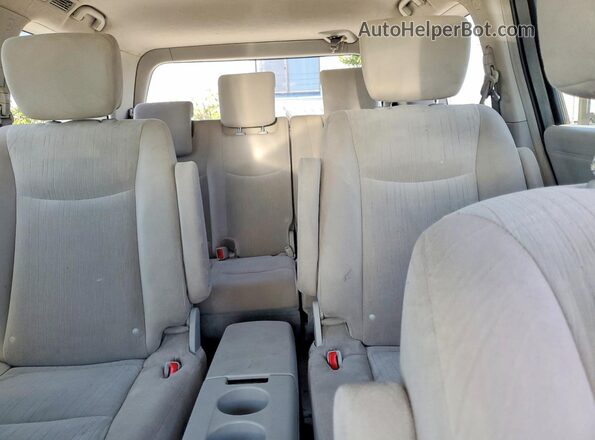 JN8AE2KP1G9156439 2016 NISSAN QUEST Gray Rear seats view