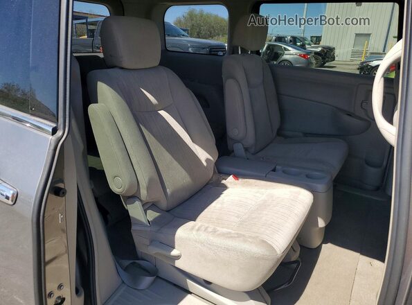 JN8AE2KP2G9150598 2016 NISSAN QUEST Gray Widok wnętrza z tyłu