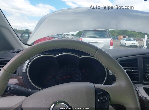 JN8AE2KP9G9153790 2016 NISSAN QUEST Gray Vista de los asientos traseros