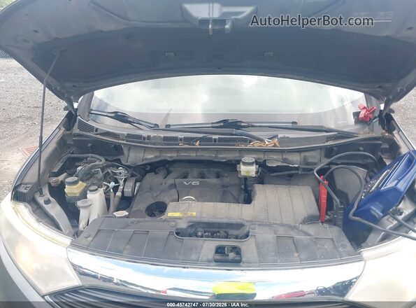 JN8AE2KP9G9153790 2016 NISSAN QUEST Gray Vista trasera
