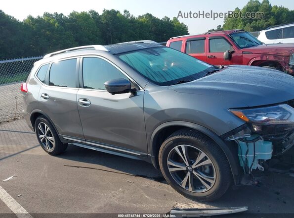 JN8AT2MT0HW150554 2017 NISSAN ROGUE Gray Vista interior trasera