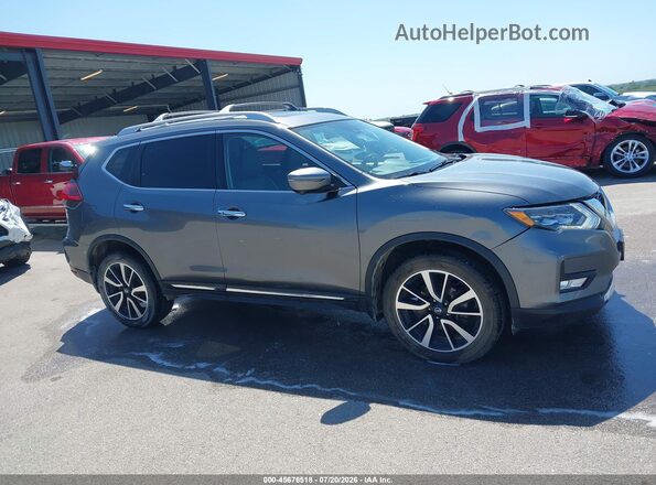 JN8AT2MVXJW306610 2018 NISSAN ROGUE Gray Vista interior trasera