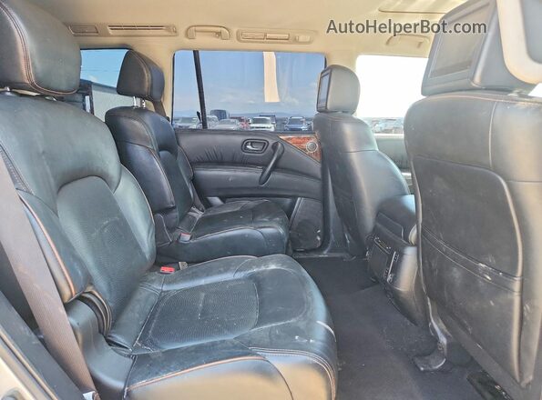 JN8AY2NE2J9732385 2018 NISSAN ARMADA Silver Vista interior trasera
