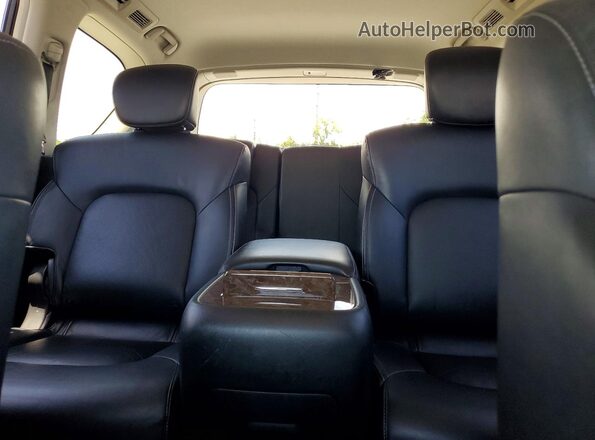 JN8AZ2NE1G9122015 2016 INFINITI QX80 White Vista de los asientos traseros