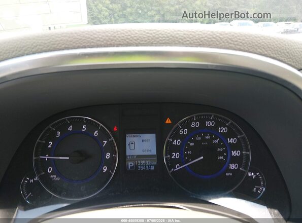 JN8CS1MU7GM670470 2016 INFINITI QX70 Tan Vista de los asientos traseros