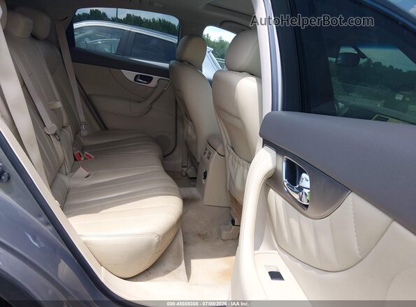 JN8CS1MU7GM670470 2016 INFINITI QX70 Tan Vista de la etiqueta del VIN