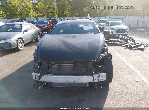 JTDAAAAF4R3024128 2024 TOYOTA CROWN Black Սալոնի հետևի տեսք