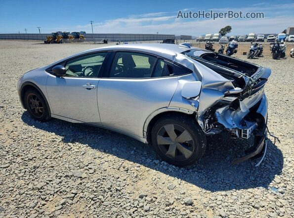 JTDACAAUXR3016513 2024 TOYOTA PRIUS Silver Trasero izquierdo