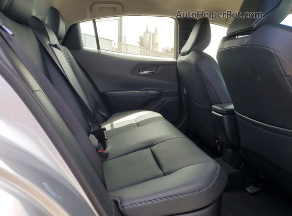 JTDACAAUXS3060579 2025 TOYOTA PRIUS Silver Vista de los asientos traseros