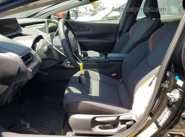 JTDACACU8S3041624 2025 TOYOTA PRIUS Черный Вид салона спереди