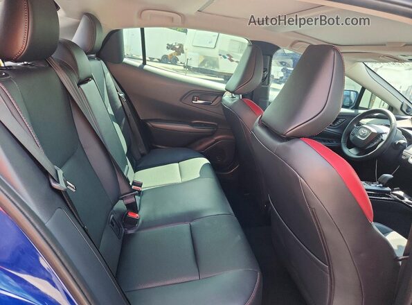 JTDACACUXT3055428 2026 TOYOTA PRIUS Blue Rear interior view