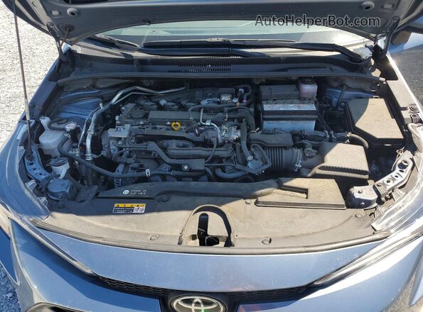 JTDB4MEE4P3011634 2023 TOYOTA COROLLA Blue Rear interior view