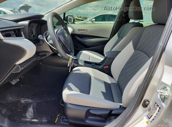 JTDB4MEE5PJ000539 2023 TOYOTA COROLLA Silver Вид салону спереду