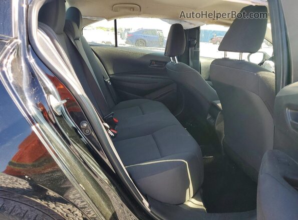 JTDB4MEE5PJ001268 2023 TOYOTA COROLLA Black Vista de los asientos traseros