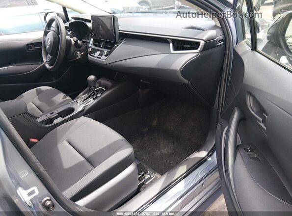 JTDB4MEE5PJ006101 2023 TOYOTA COROLLA Light Blue Вид салона спереди
