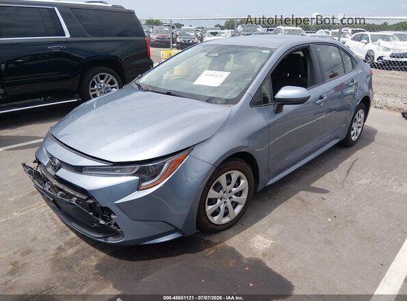 JTDB4MEE5PJ006101 2023 TOYOTA COROLLA Light Blue Передняя левая четверть