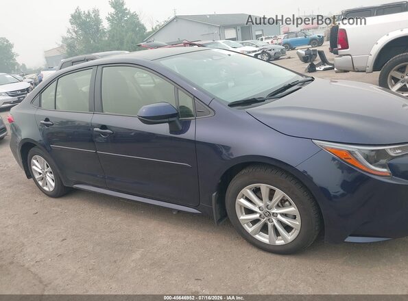 JTDB4MEE6RJ015098 2024 TOYOTA COROLLA Blue Vista interior trasera
