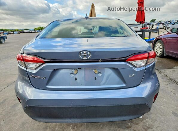 JTDB4MEE8PJ010711 2023 TOYOTA COROLLA Серый Вид сзади