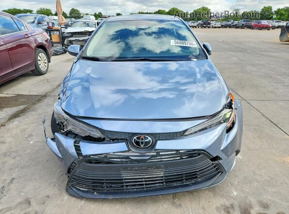 JTDB4MEE8PJ010711 2023 TOYOTA COROLLA Серый Вид спереди