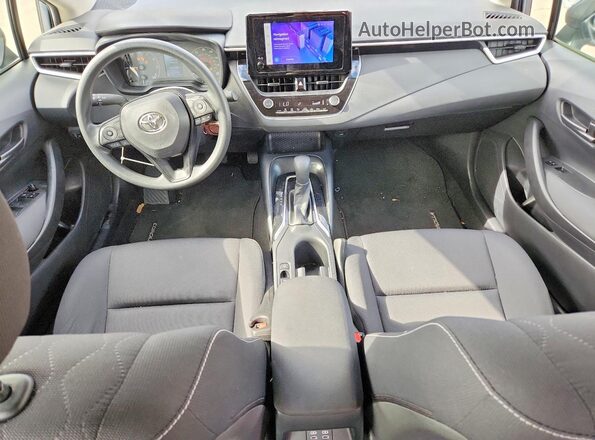 JTDB4MEE8PJ010711 2023 TOYOTA COROLLA Серый Вид панели приборов