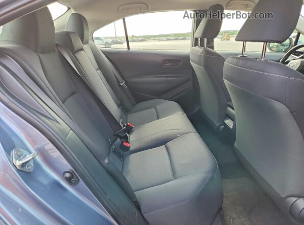 JTDB4MEE8PJ010711 2023 TOYOTA COROLLA Серый Вид задних сидений