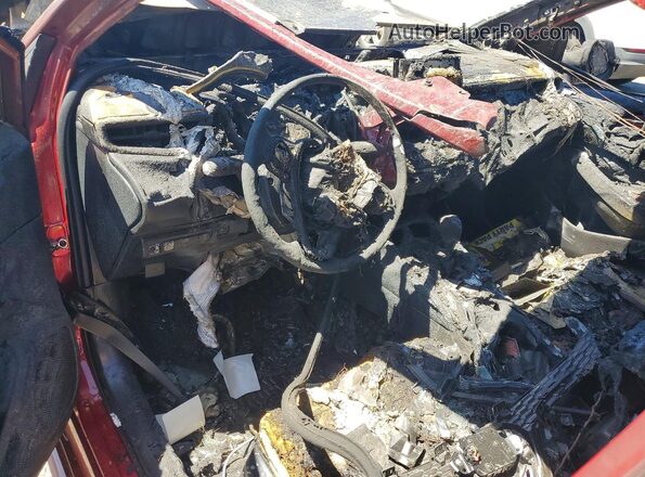 JTDB4MEE9T3034367 2026 TOYOTA COROLLA Red Vista del salpicadero