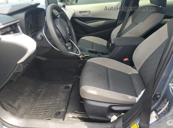 JTDBCMFE0S3098345 2025 TOYOTA COROLLA Серый Вид салона спереди