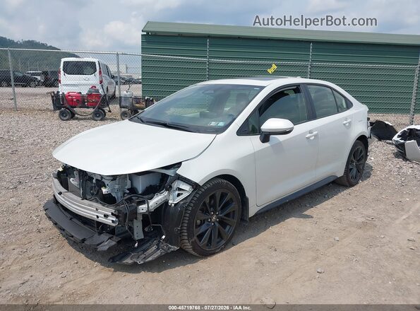 JTDBCMFE1PJ014715 2023 TOYOTA COROLLA White Vista tres cuartos delantera izquierda