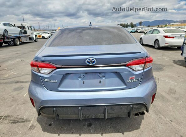 JTDBCMFE1R3035149 2024 TOYOTA COROLLA Blue Вид ззаду