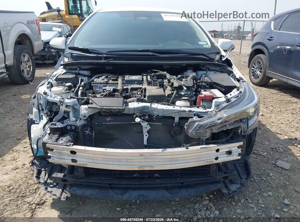 JTDBCMFE2R3043230 2024 TOYOTA COROLLA White Vista interior trasera