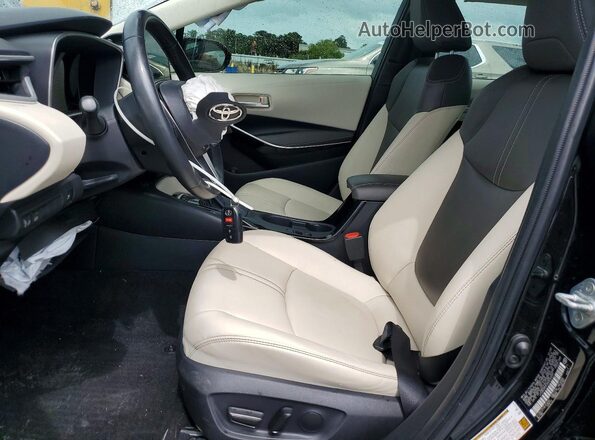 JTDBCMFE3R3043091 2024 TOYOTA COROLLA Black Front interior view
