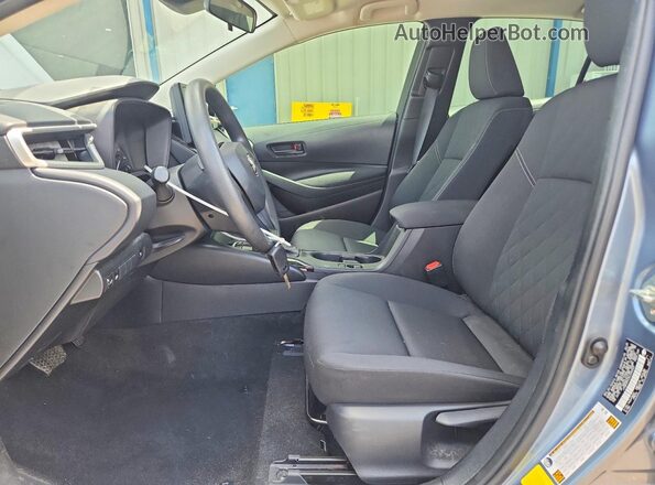JTDBCMFE3SJ045523 2025 TOYOTA COROLLA Blue Front interior view