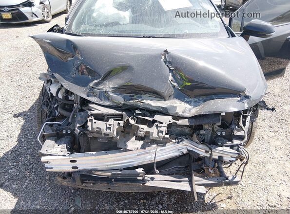 JTDBCMFE4R3036909 2024 TOYOTA COROLLA Gray Rear view