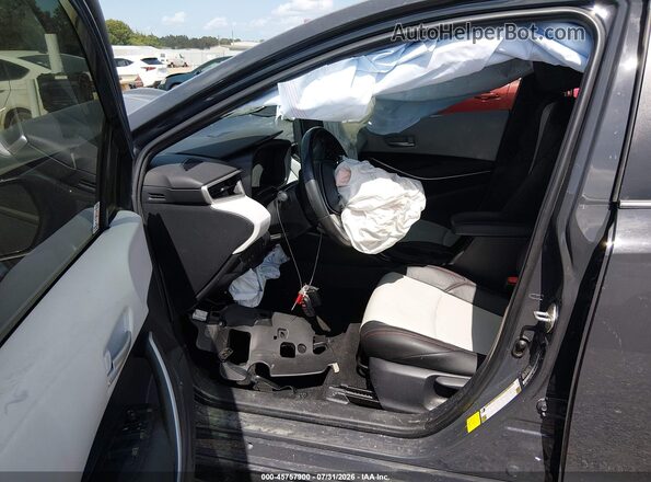 JTDBCMFE4R3036909 2024 TOYOTA COROLLA Gray Front interior view