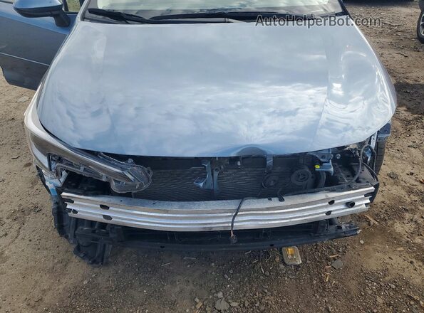 JTDBCMFE4SJ037656 2025 TOYOTA COROLLA Blue Vista interior trasera