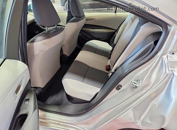 JTDBCMFE4T3122891 2026 TOYOTA COROLLA Silver Vista de los asientos traseros