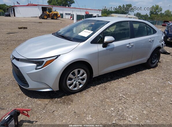 JTDBCMFE4T3137634 2026 TOYOTA COROLLA HYBRID Silver Vista tres cuartos delantera izquierda