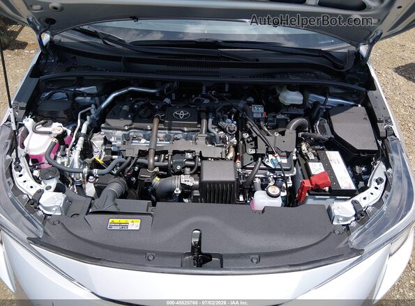 JTDBCMFE4T3137634 2026 TOYOTA COROLLA HYBRID Silver Vista trasera