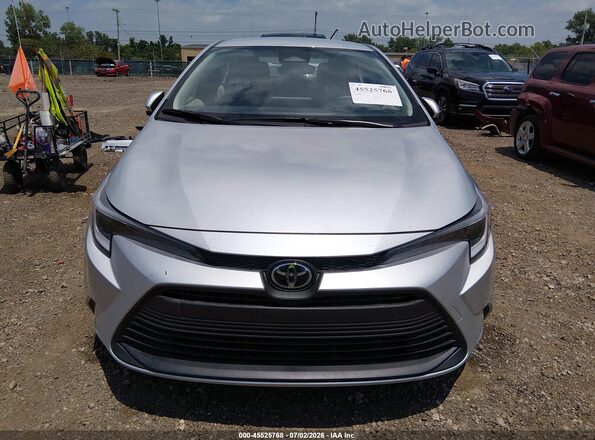 JTDBCMFE4T3137634 2026 TOYOTA COROLLA HYBRID Silver Vista interior trasera