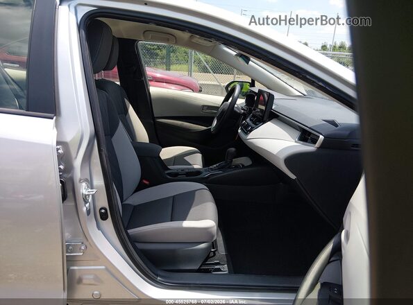 JTDBCMFE4T3137634 2026 TOYOTA COROLLA HYBRID Silver Vista interior delantera